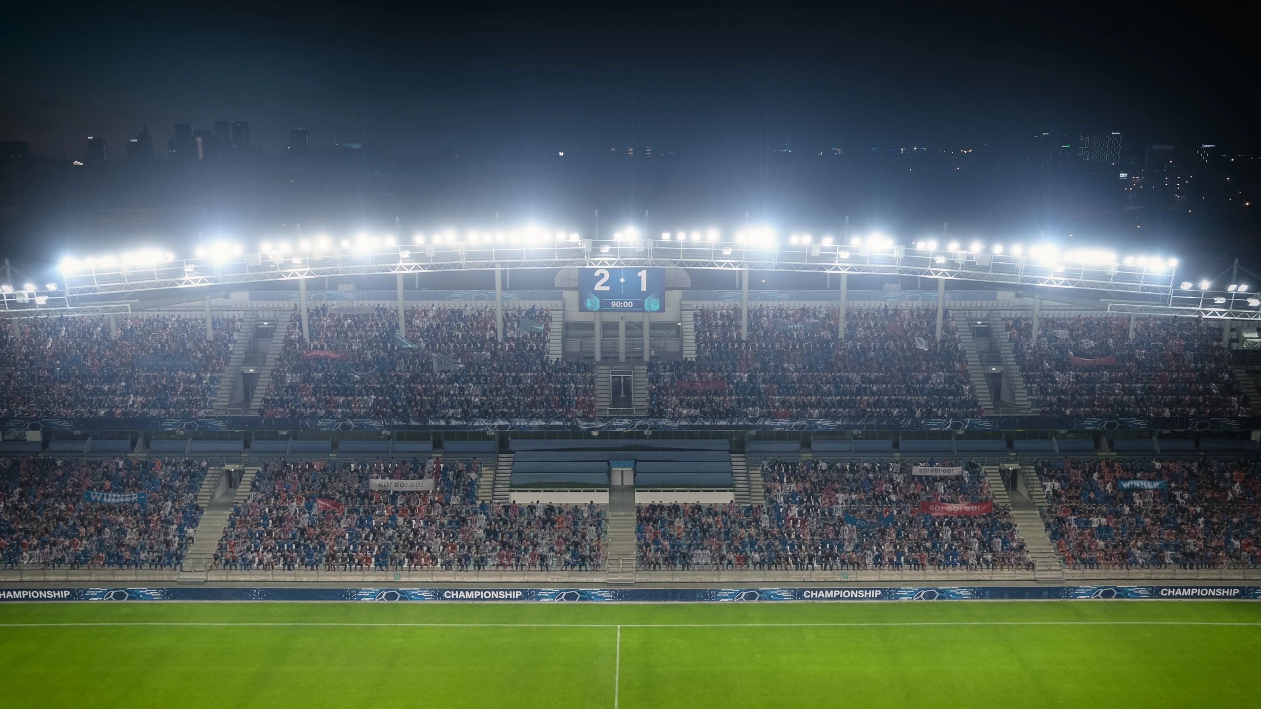 Stadium crowd with a scoreboard, representing game-day betting context